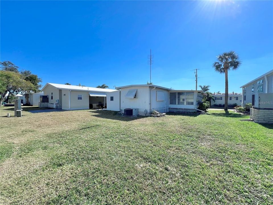 Backyard with plenty of room to expand or put a larger unit on the lot.