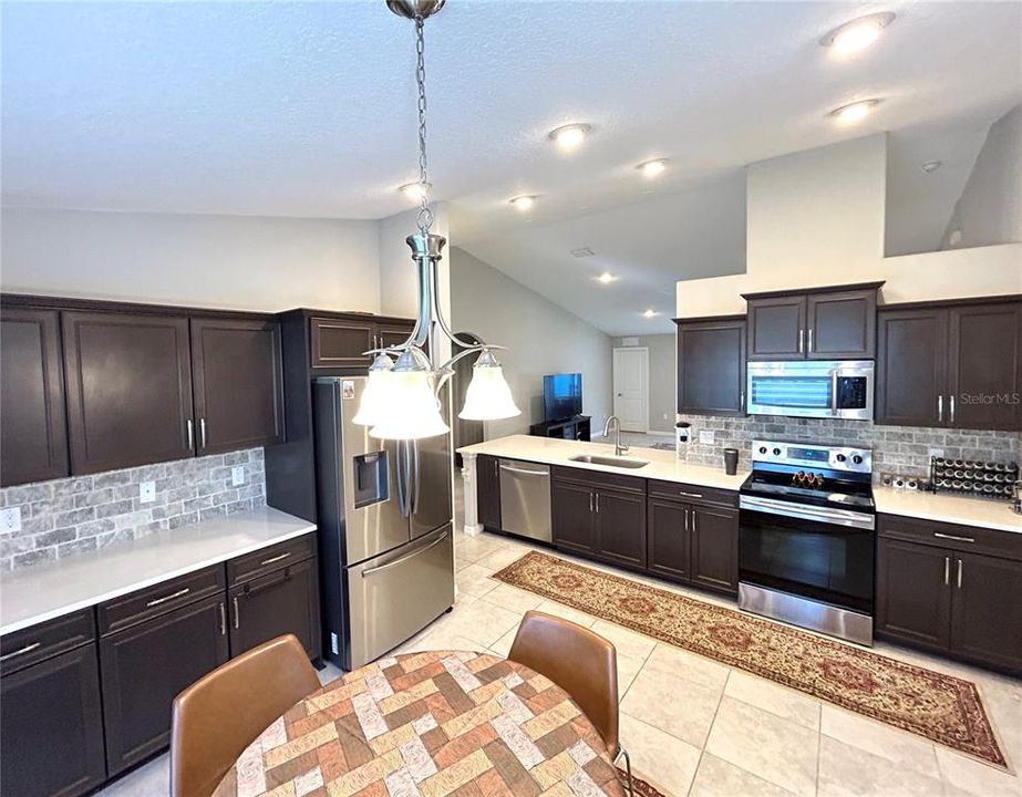 Discover your inner chef in this gourmet kitchen with stainless steel appliances