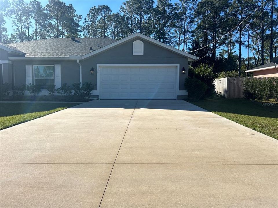 Two Car Garage with Wide Driveway