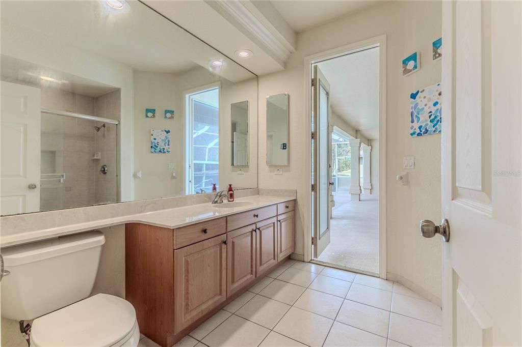 Guest bathroom with Walk in Shower & Access to Pool