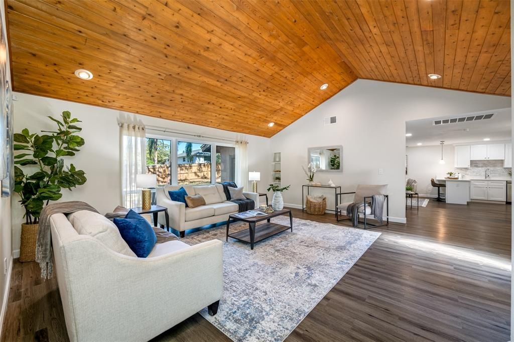 Open living area captures views of rear fenced yard