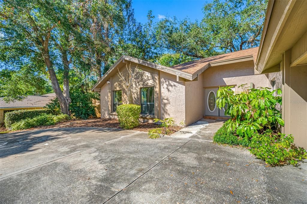 Driveway and entrance area.  Two car garage is to the right (not pictured)