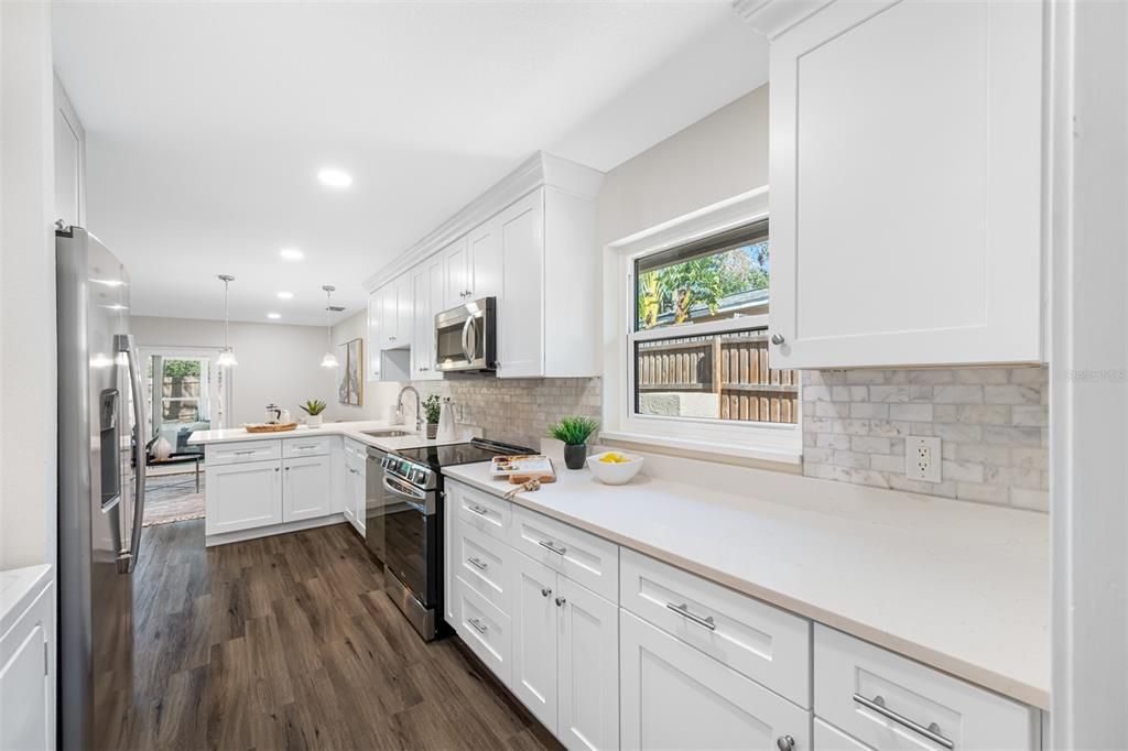 Entry door from garage leads into kitchen