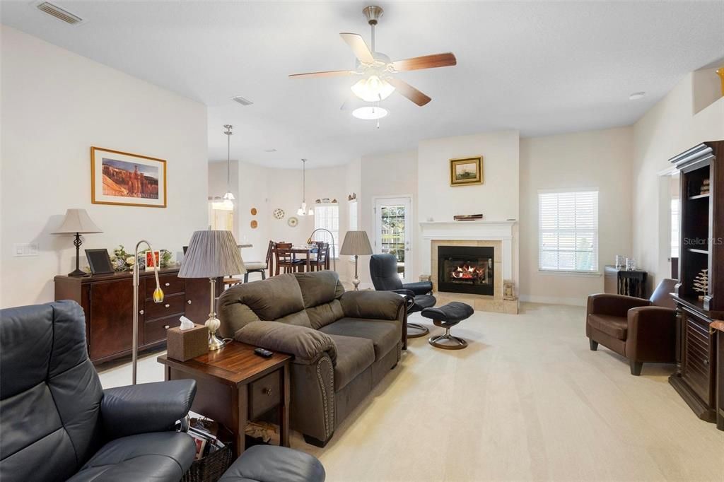 Main living area towards fireplace.