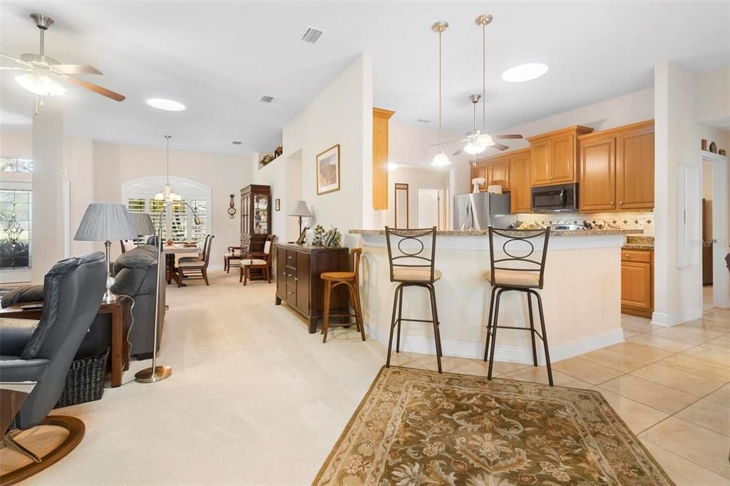 Main living area at left. Kitchen at right.