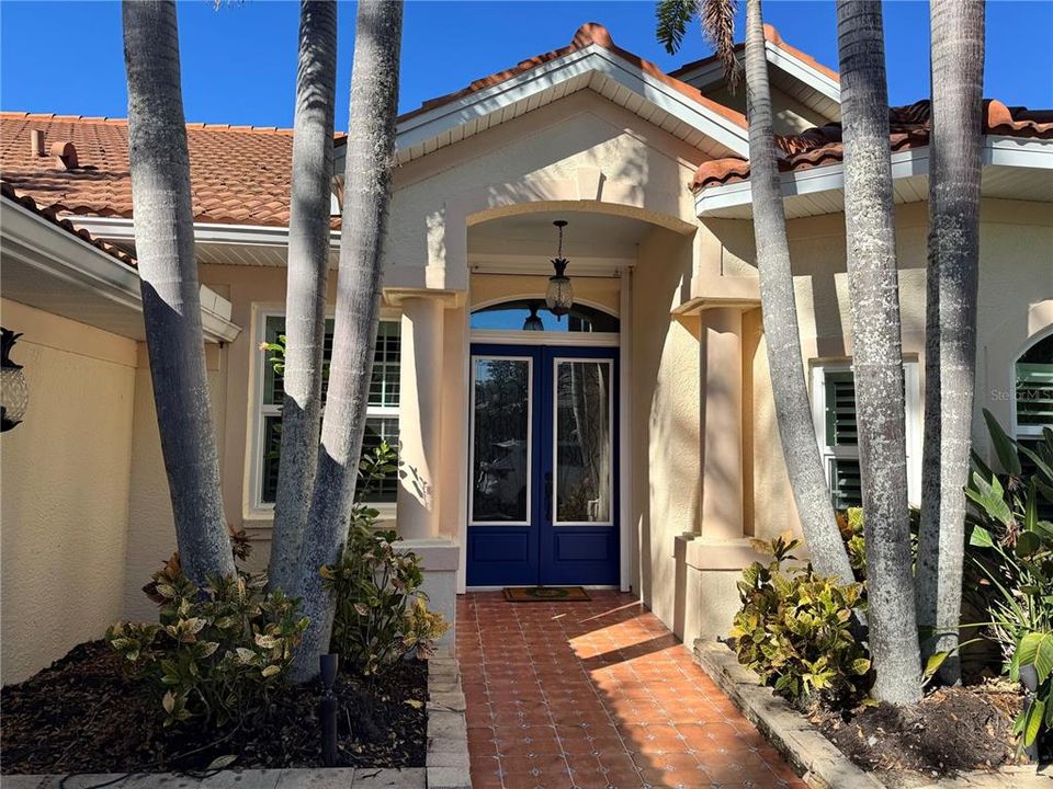 Front Entrance with tile entry and Double Doors