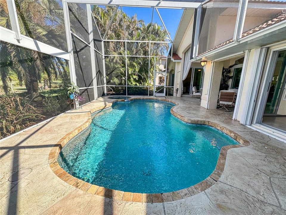 Pool with view of golf course