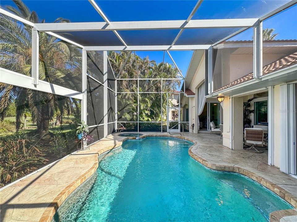 Pool with view of golf course