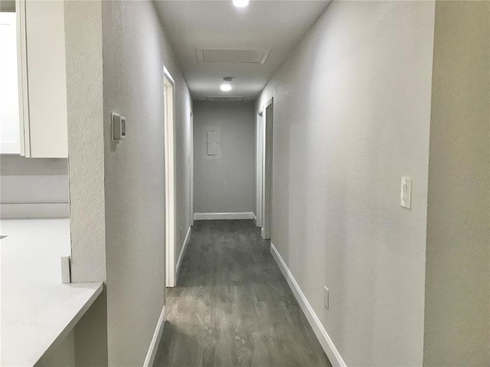 Hallway to guest bath and bedrooms