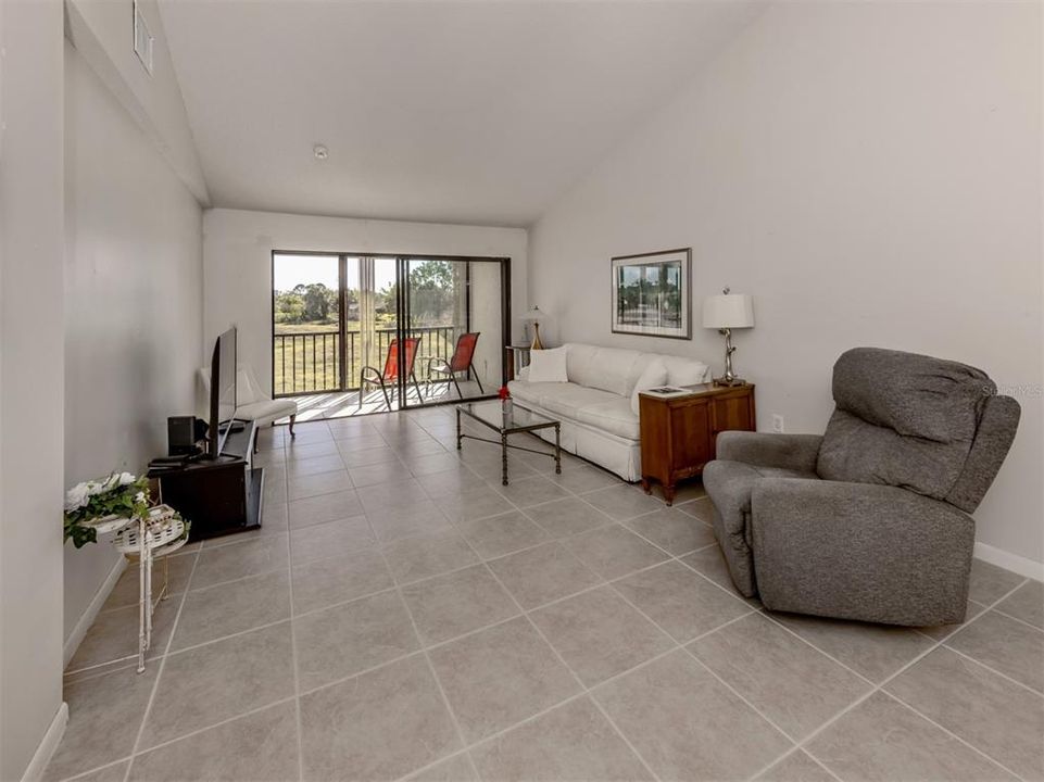 Living room with high cathedral ceiling