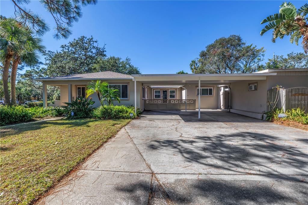 Large Driveway and Covered Carport