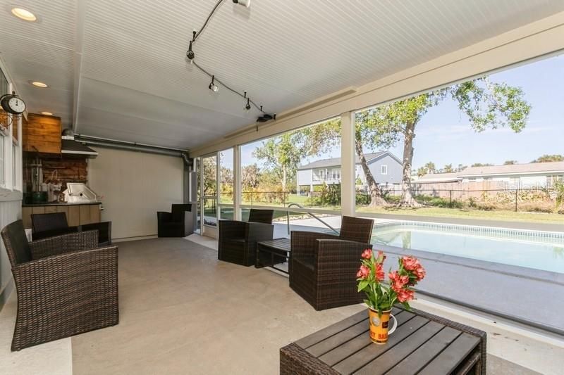 Screened Porch overlooking Pool