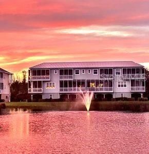 Back of townhouse at sunset