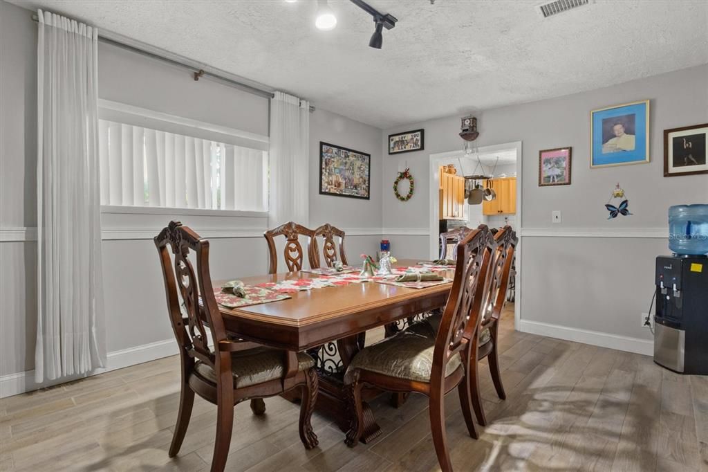 Formal dining room, tiled floors.