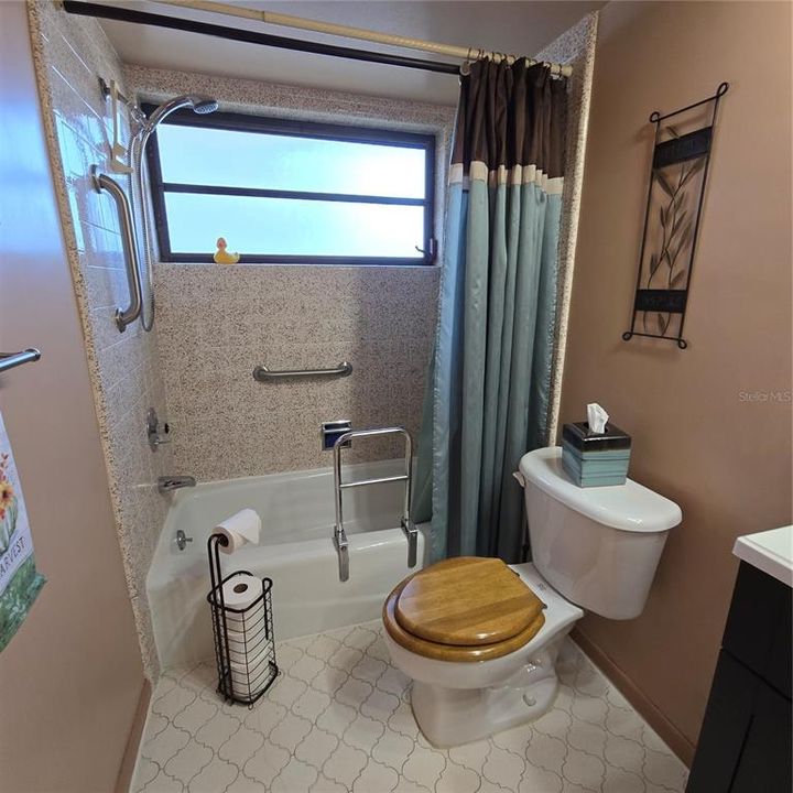 Tile in shower/tub in bathroom 2