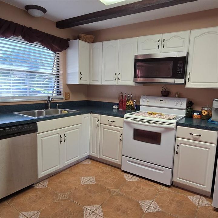 Kitchen with lots of cabinets and counterspace for the cook in the family