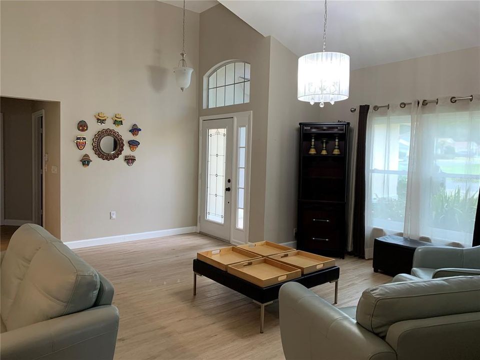 Looking towards front door entry way - sitting area to right can be a formal dining room