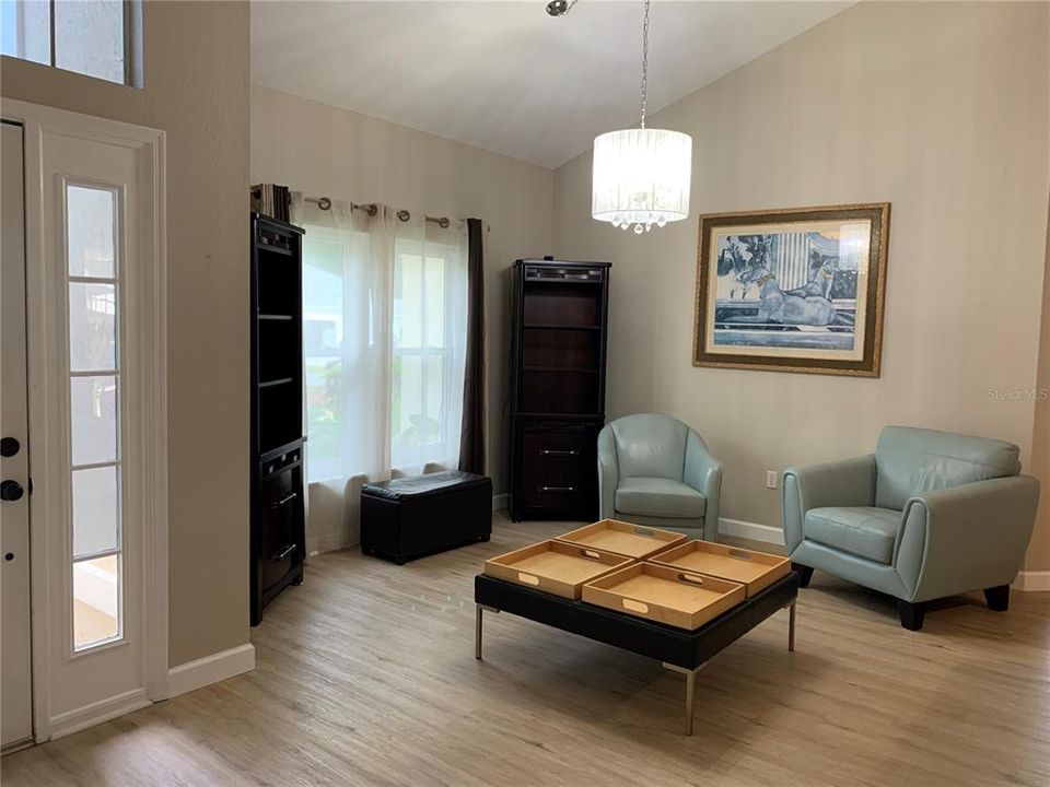 Sitting area or formal dining room.  Look at the floors...new LVP throughout the home