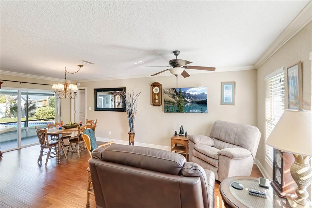 Formal living room with crown molding.