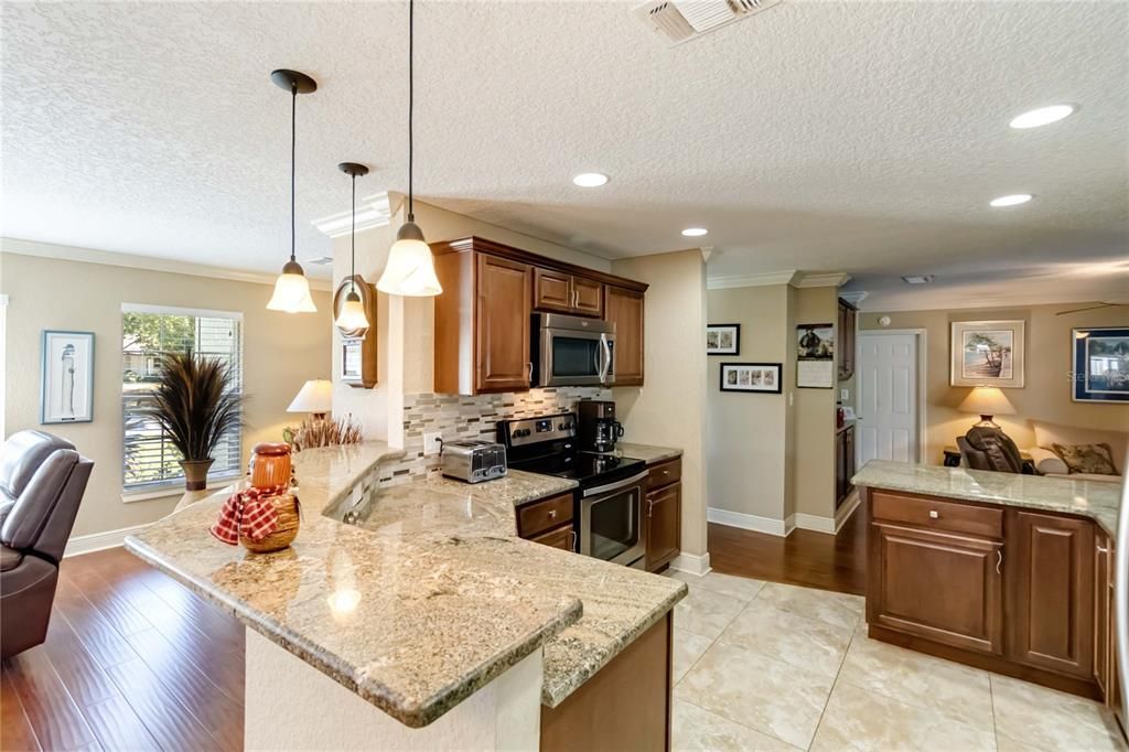 Pendant lights and breakfast bar.