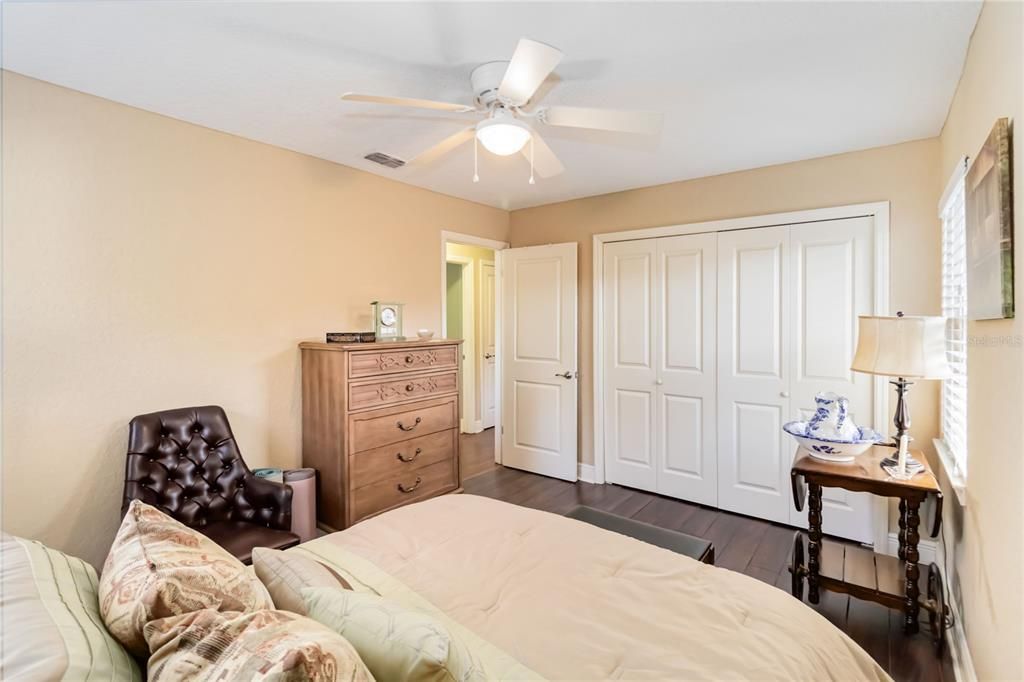 Guest bedroom with generous size closet.