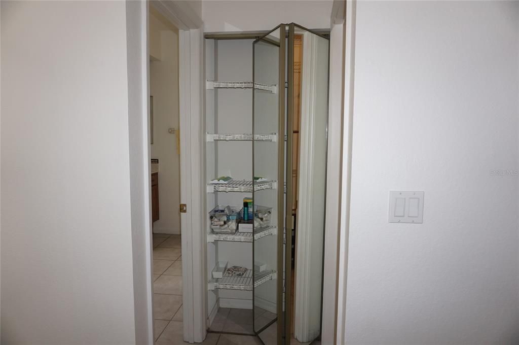 Linen closet in master bedroom