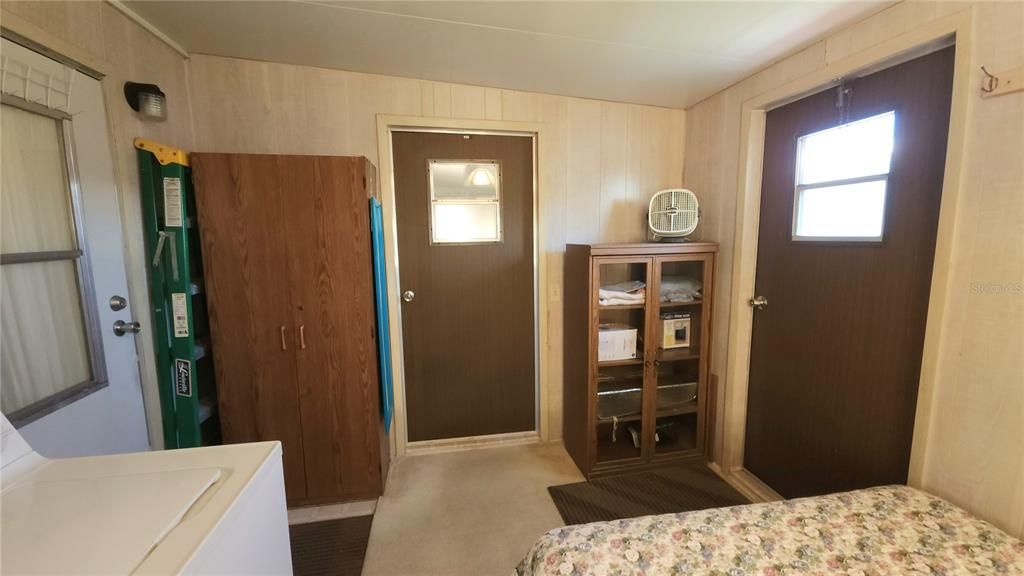 Second Bedroom with door to exterior and to Bonus Room