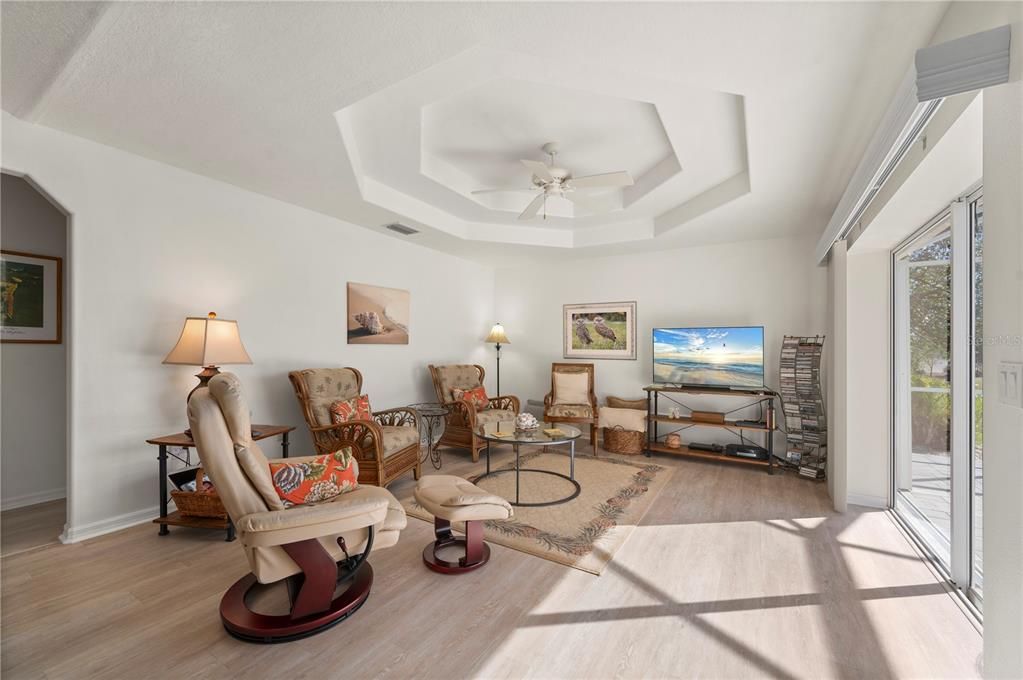 Family room with gorgeous tray ceiling