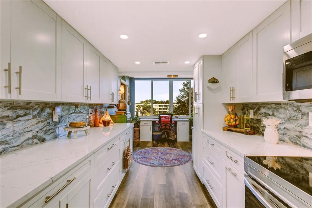 Long galley kitchen with stainless appliances!