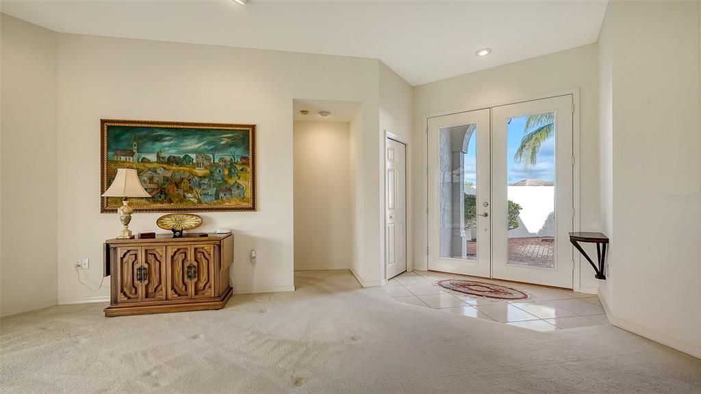 Living room/front door to courtyard