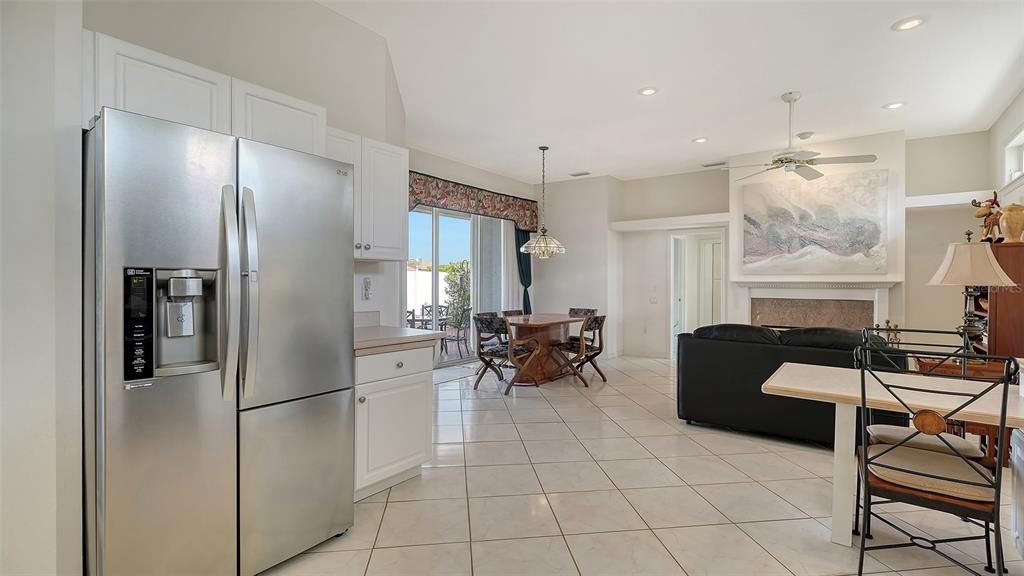 Oversized kitchen with eat in area plus an extra sitting space.