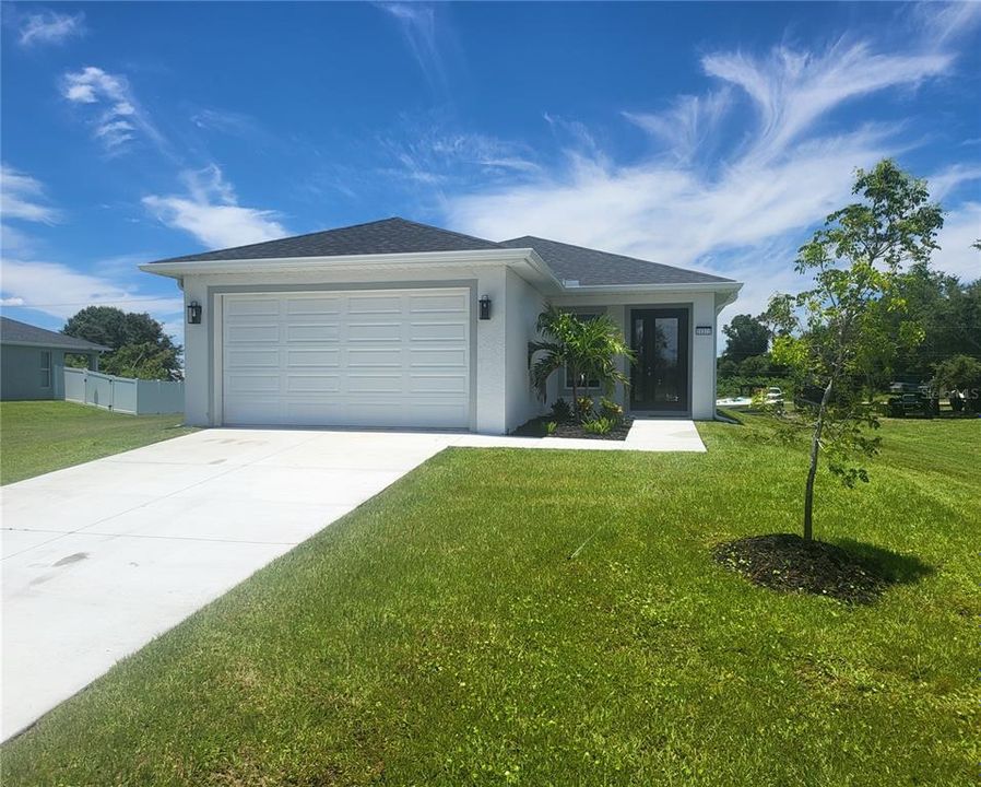 Front Door and Double Car Garage