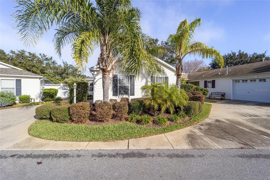 Your driveway and front door are on the left.