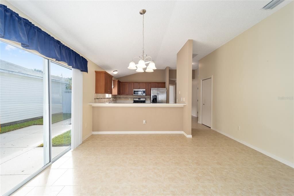 The eating area is a step or two away from the side patio.