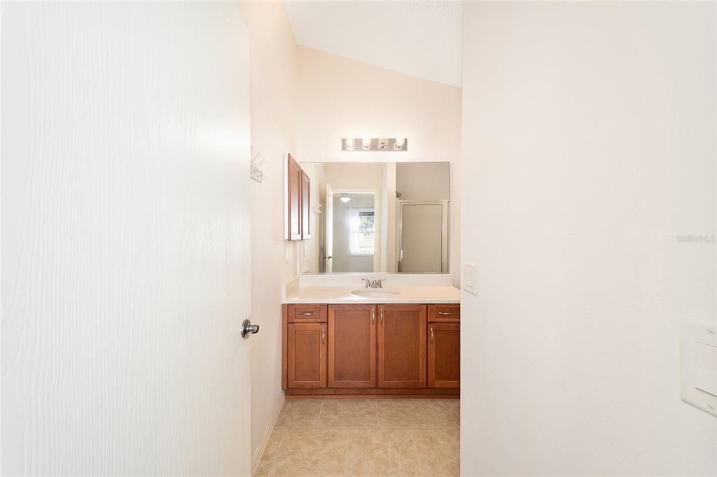 looking to the bathroom from the primary bedroom