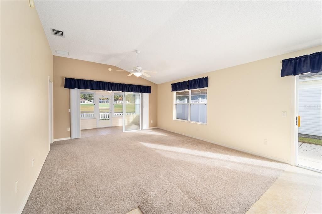 The vaulted ceiling gives the living room a spacious, bright and airy feeling.