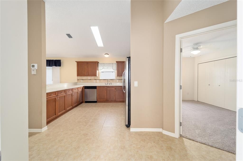 Looking into the kitchen and 3rd bedroom