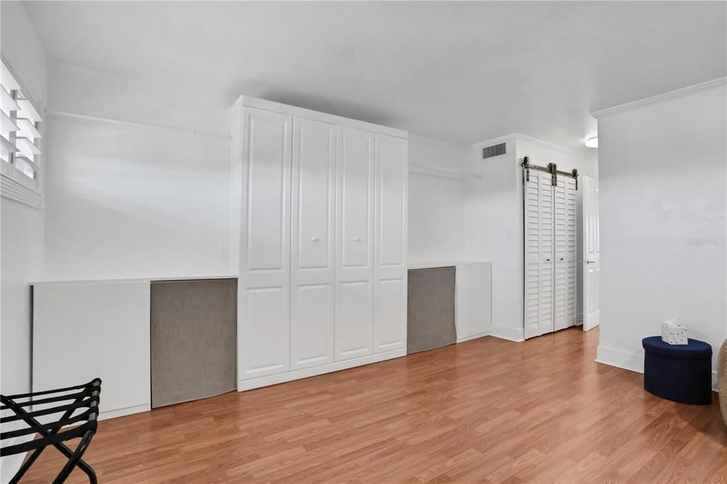 Murphy bed in guest bedroom with seperate door