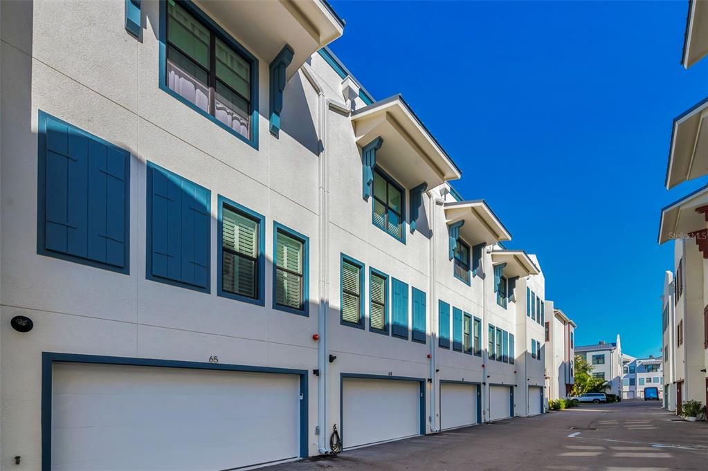 REAR OF UNIT/ GARAGE ACCESS.