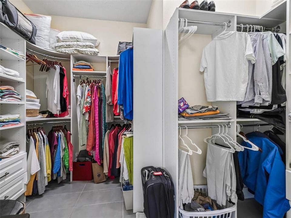 Custom walk-in closet treatment in primary bedroom