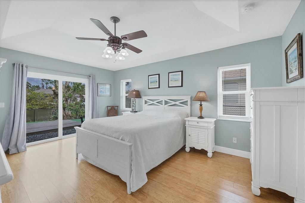 Relax in the Primary Bedroom with Coffered Ceiling