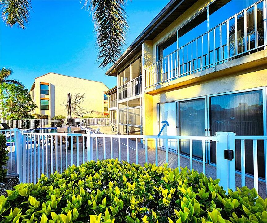 View of the rear of the condo on the first floor, off the right of the photo