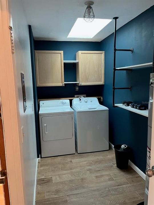 Laundry room is inside the home, entry to garage with a skylight