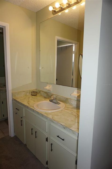 Separate vanity outside of bathroom