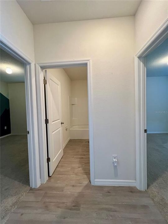 Hallway to guest bedrooms and bathrooms