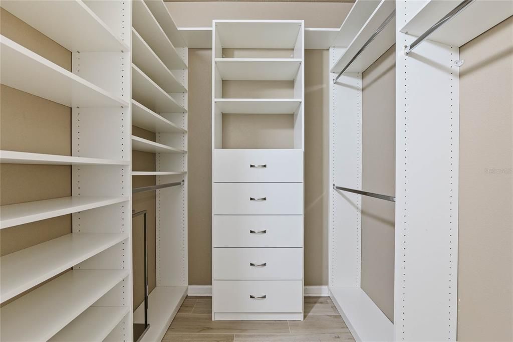 9' x 6'8" walk-in closet w/ organizer for Primary Bedroom