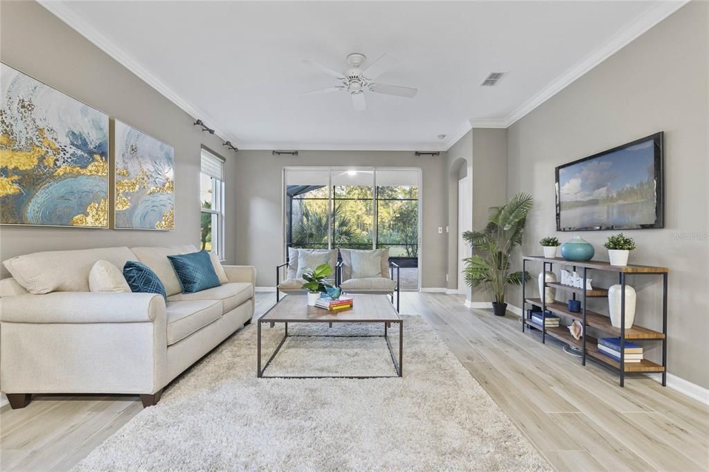 View of the Family Room & spacious screen enclosed covered lanai