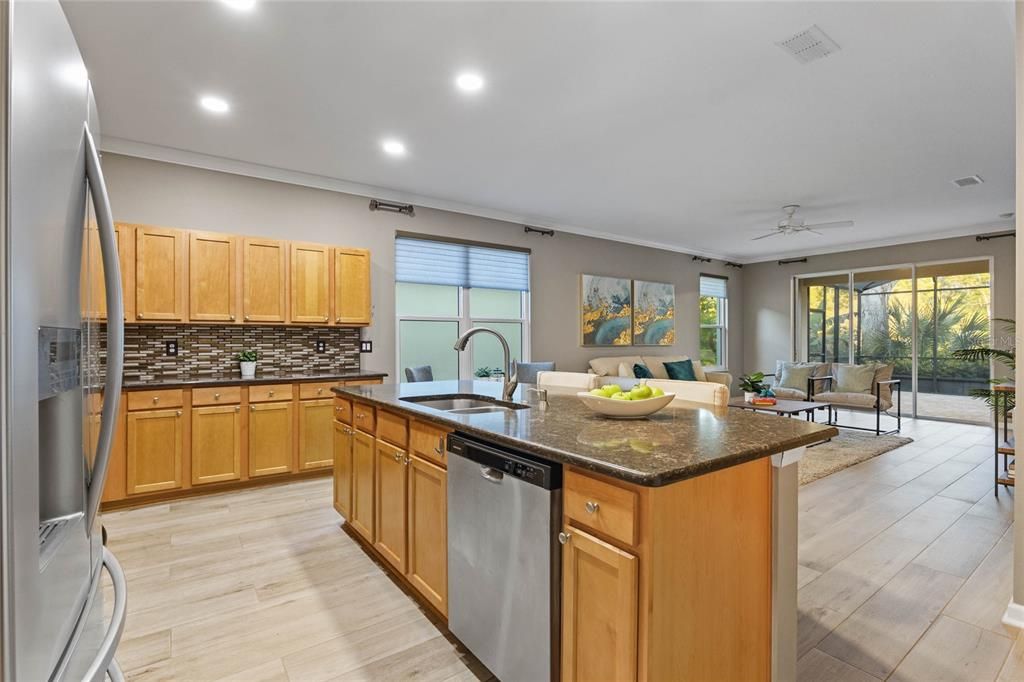 View of the Breakfast island, Dinette & Family Room areas