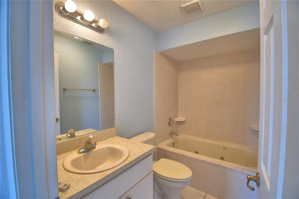 master bath with whirlpool tub