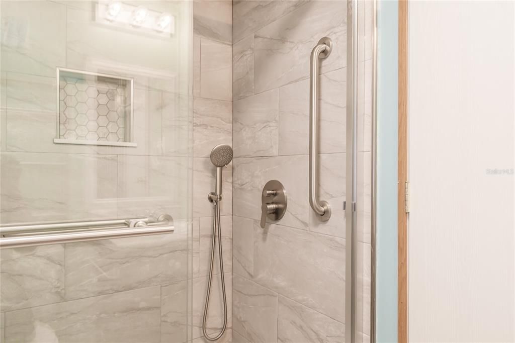 Custom tile with rainfall shower